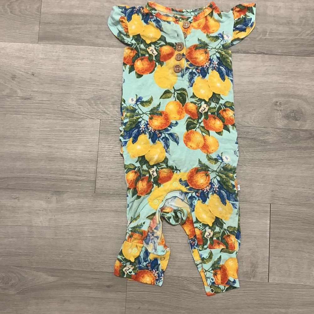 Posh peanut ruffle butt onesie